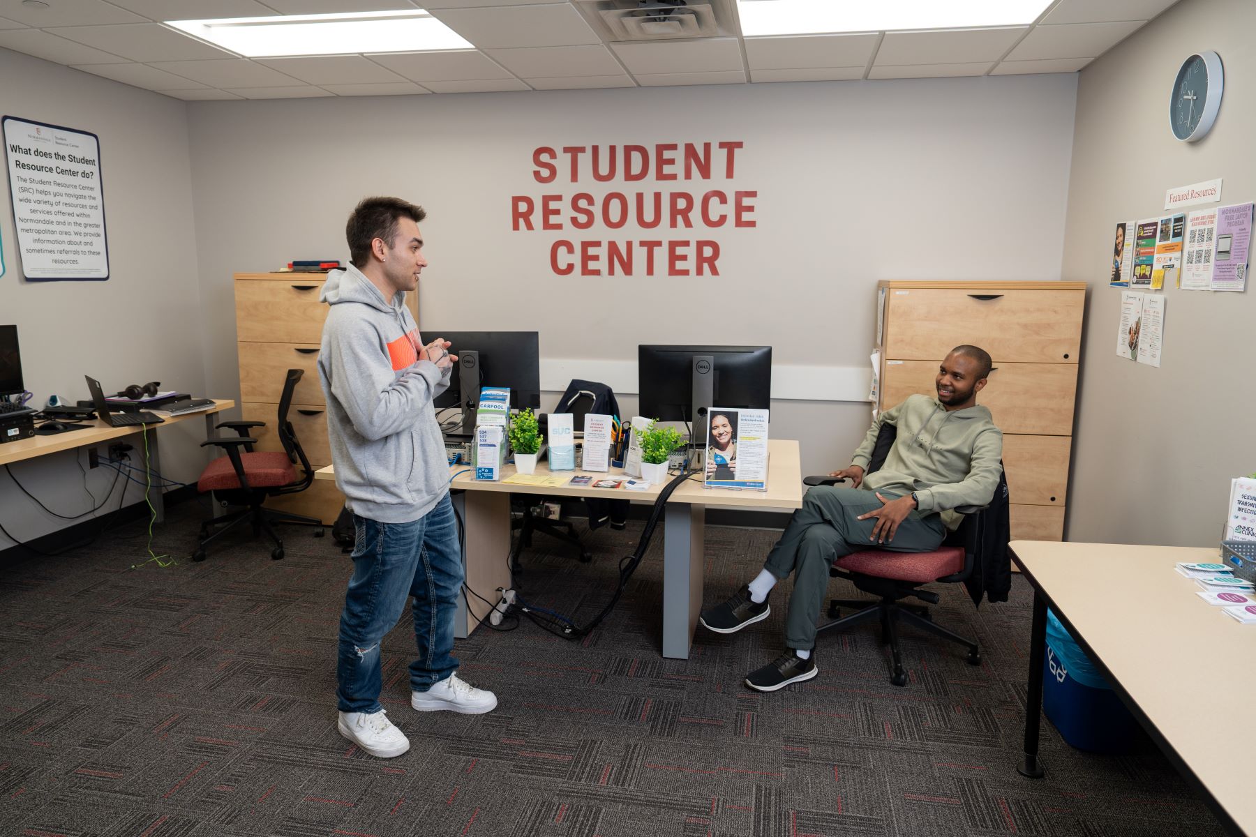 A student receives help in the Student Resource Center.